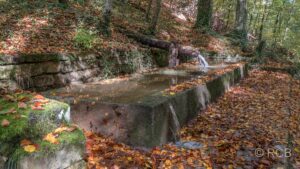 überlaufender Brunnen